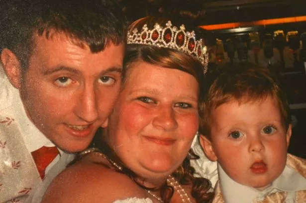 Amanda Booth, pictured on her wedding day with husband David and son Lucas