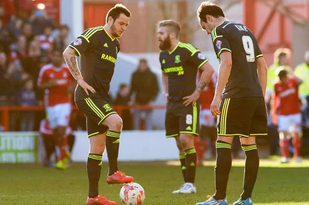 Lee Tomlin and Kike look dejected after Nottingham Forest's second goal