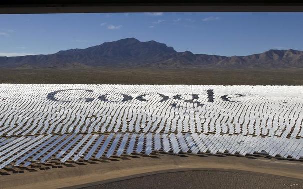 The Google logo is spelled out in heliostats (mirrors that track the sun and reflect the sunlight onto a central receiving point) during a tour of the Ivanpah Solar Electric Generating System in the Mojave Desert near the California-Nevada border February 13, 2014. REUTERS/Steve Marcus