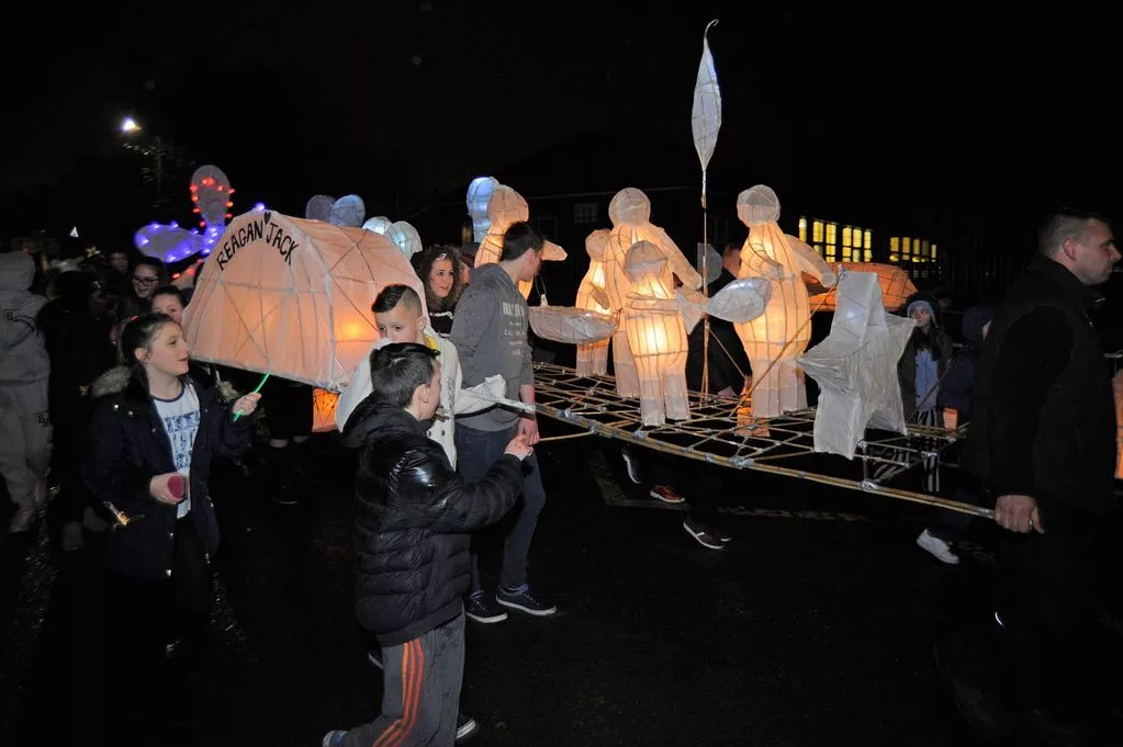 Tilery Primary School annual Community Lantern Parade. Children and adults parade with lanterns around Tilery