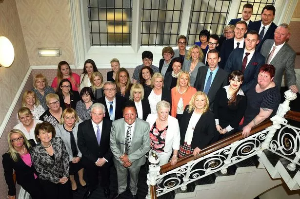 Mayor Ray Mallon (front centre) with staff and management