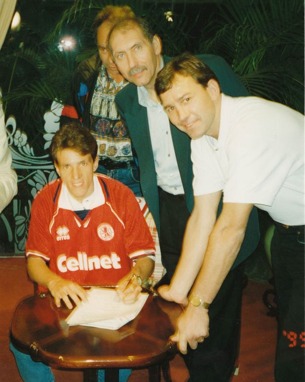 Juninho signs with Bryan Robson and Keith Lamb when he signed in 1995