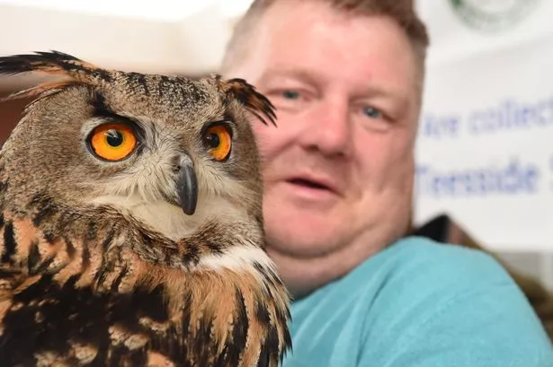 Craig Isherwood who is recovering from a stroke, pictured with Eagle Owl, Mrs Robinson