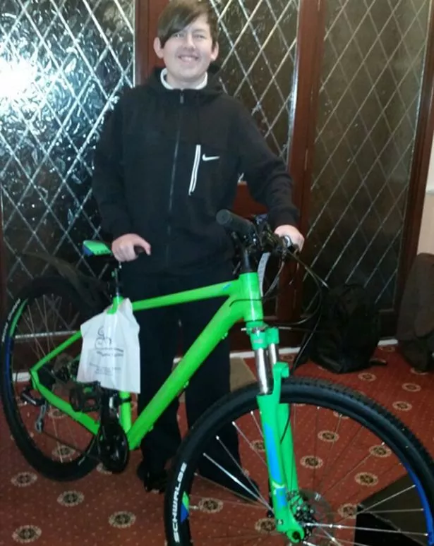 Alex with the bike stolen at knifepoint on Saturday night in Stewart Park