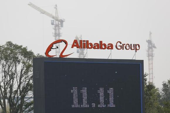 The logo of the Alibaba Group is seen inside the company's headquarters in Hangzhou, Zhejiang province November 11, 2014. REUTERS/Aly Song
