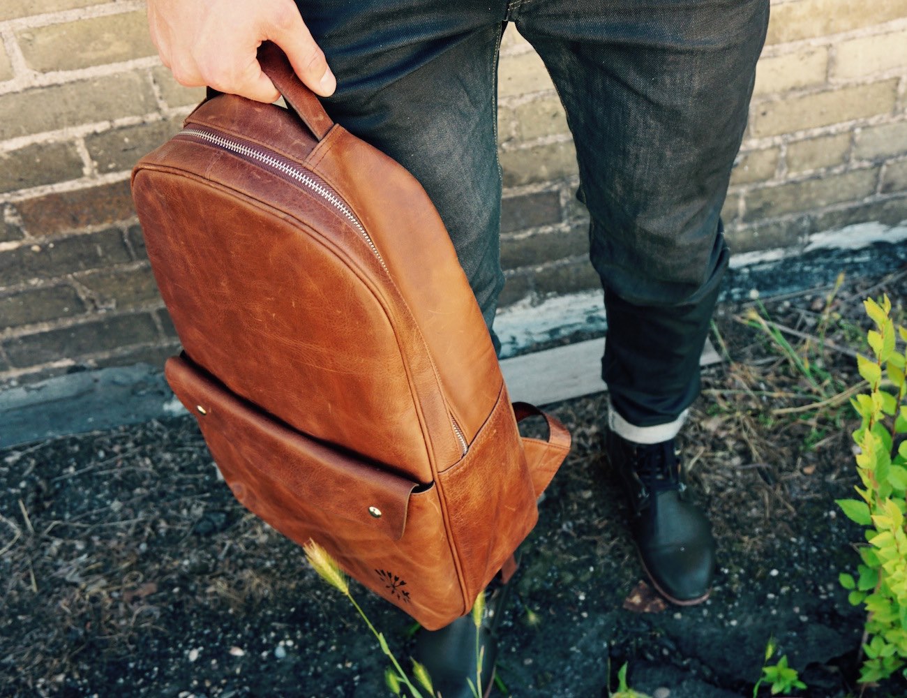 Get ready to take on the world with the Minimalist Leather Backpack by Päsk Goods.