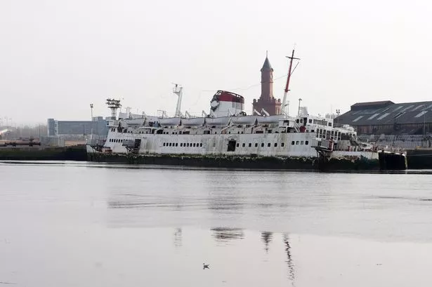 The Tuxedo Royale sits half submerged on the River Tees