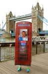 Sid Keyte aged 43 from Salisbury in his home-made telephone box in which he will run for charity during the photocall at Tower Bridge, London. PRESS ASSOCIATION Photo.