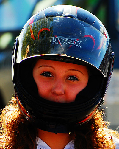 Jolien Meijer, Miss Aalsmeer 2008, helmet on, ready for a sidecar ride. CRT classic race demonstration on a street circuit in Aalsmeer, The Netherlands. - 1pHLQQo