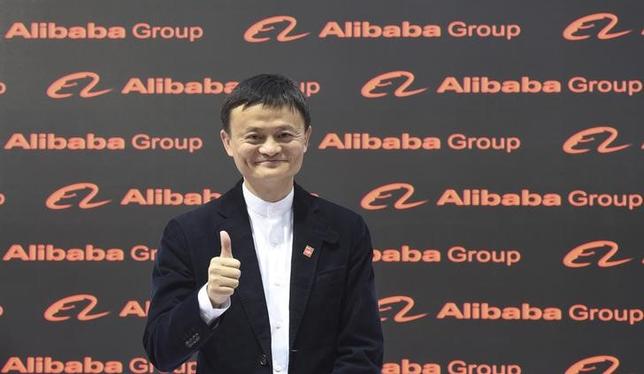 Alibaba founder and chairman Jack Ma poses for the media while touring the CeBIT trade fair in Hanover March 16, 2015. REUTERS/Fabian Bimmer