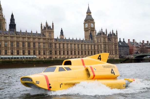 Thunderbird 4 patrols the River Thames by the Houses of Parliament