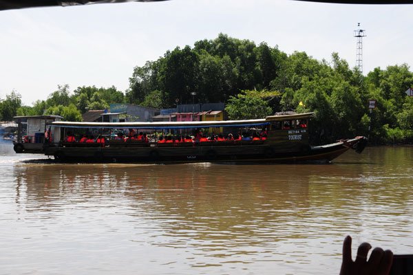 Tourists join a river tour in Can Gio District, HCMC