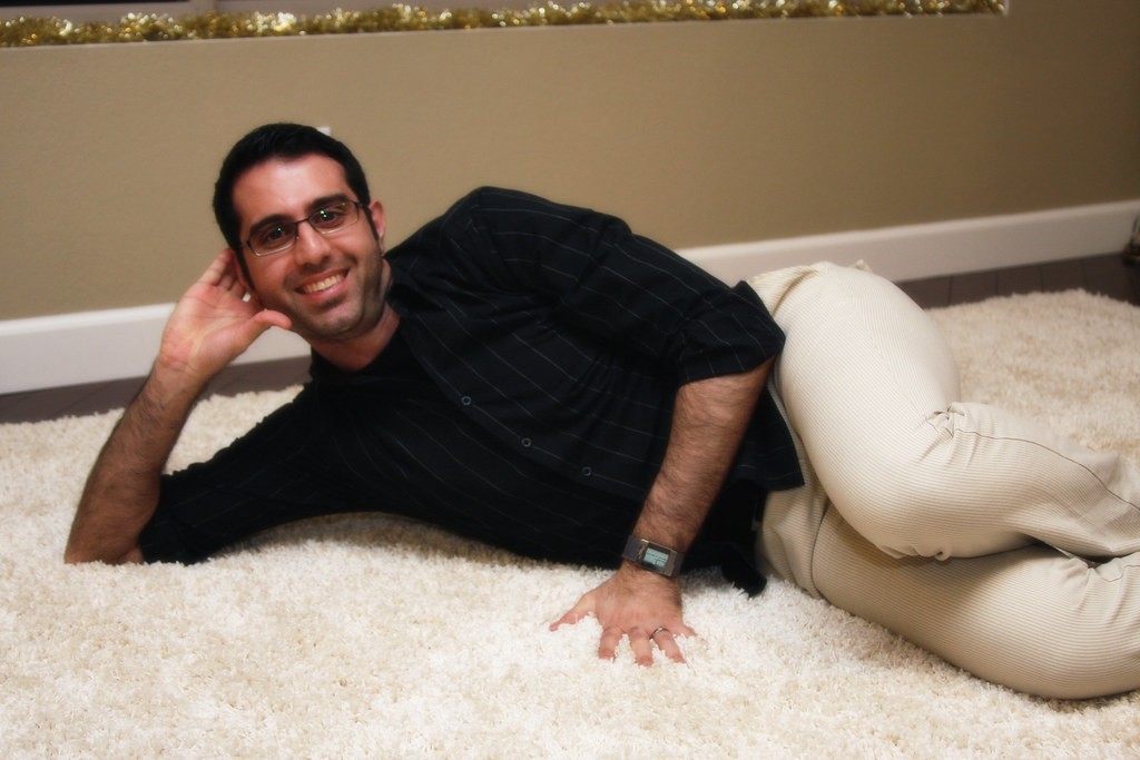 Houtan contemplates a career in adult film while running his hands through the shag carpeting.