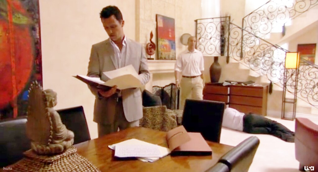 Burn Notice Buddha with Michael Weston (actor: Jeffrey Donovan), Jesse Porter (actor: Coby Bell), body, house interior in Miami, Florida (set), TV show, Buddhism in Western culture