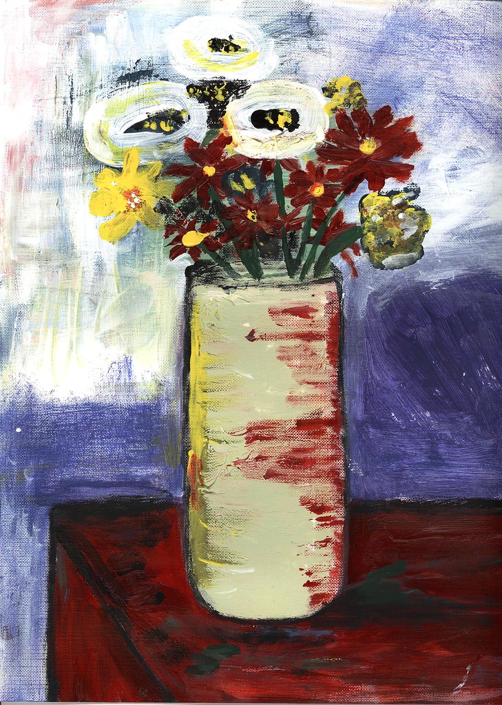 flowers in tall vase