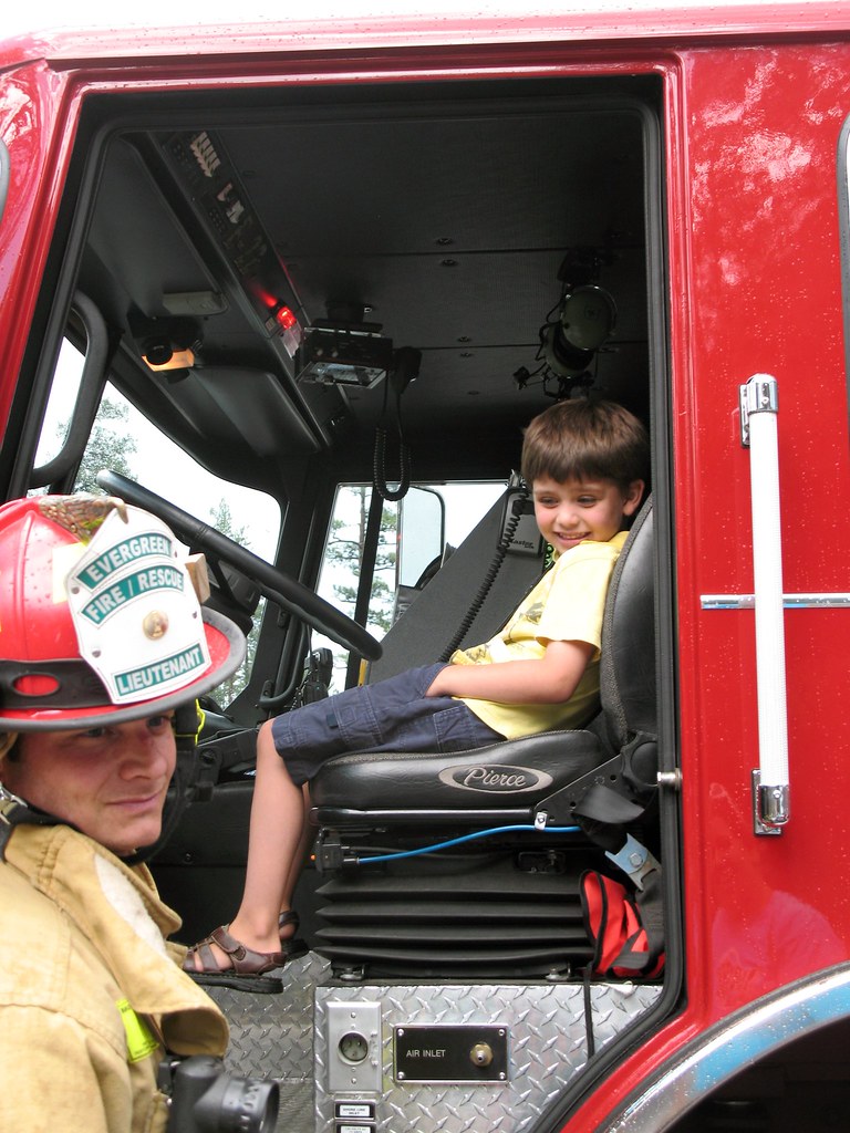 Austin sitting in the fire engine