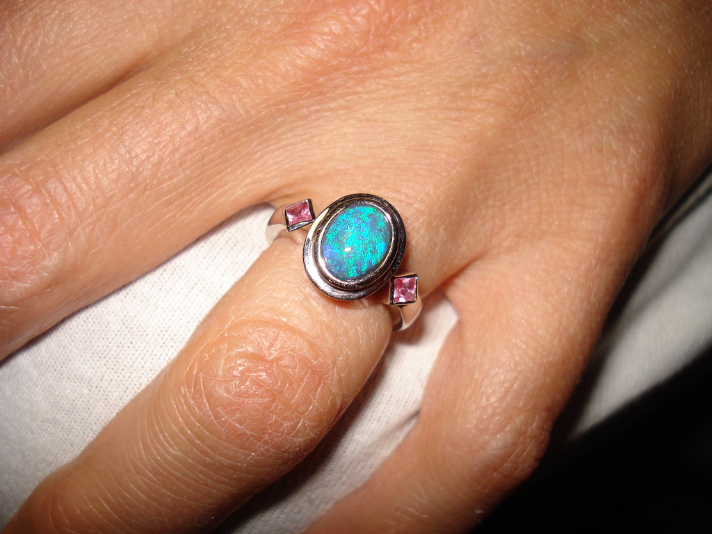 Dark opal engagement rings