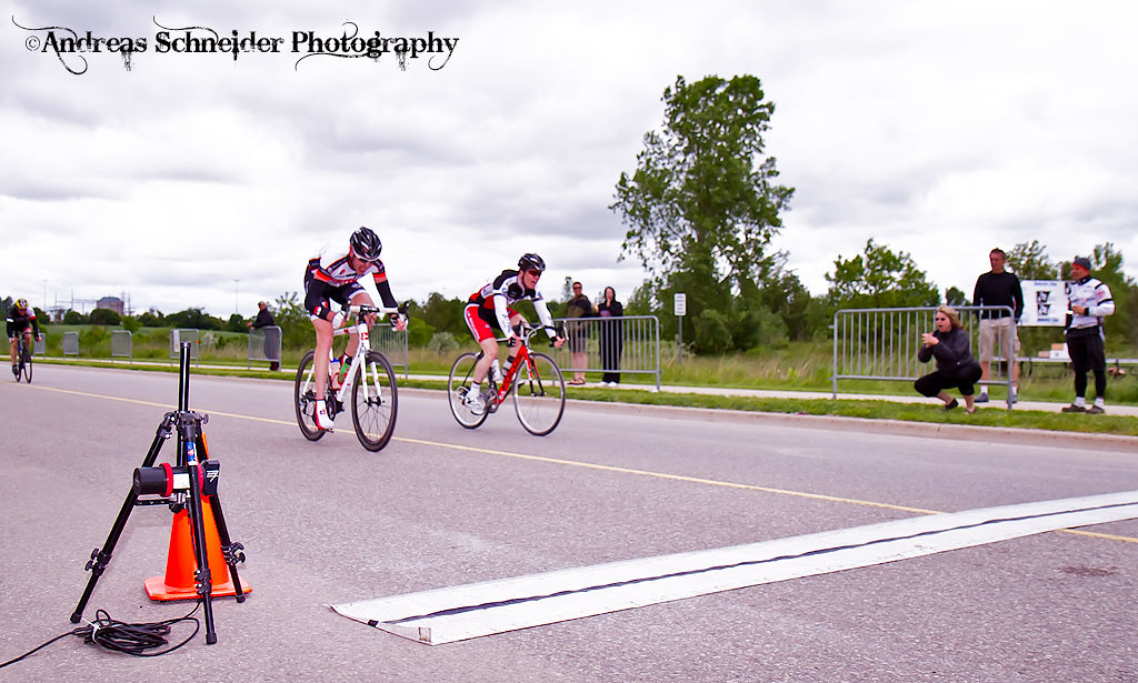 Derrek Ivey of Kallisto/Wheels Of Bloor wins the final sprint with Peter Morse of Jet Fuel Coffee/ La Bicicletta for first place in the Elite 1&2 men group in the 2011 K-W Classic Road Race, Ontario C