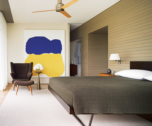 Neutral bedroom + colorful modern art: Interior design by Thad Hayes