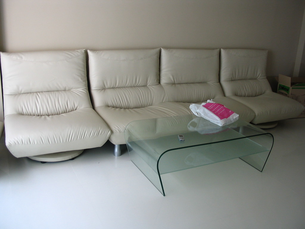 Classy Glass Coffee Table ($150) and 1 Seater Leather Chair ($150)