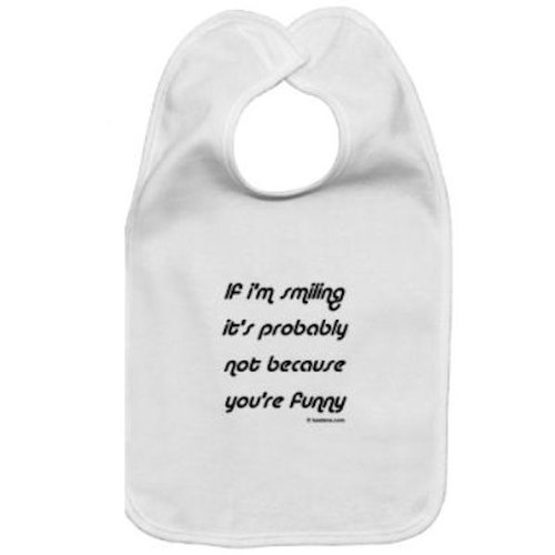 Cotton baby bib If I'm smiling it's probably not because you're funny with velcro closure and white pink or blue trim 0-36 months
