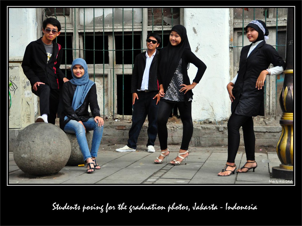 Muslim fashion - students posing for the graduation photos in Jakarta - Indonesia