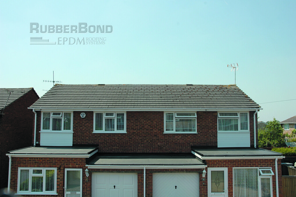 Semi detached houses with matching RubberBond flat roofs