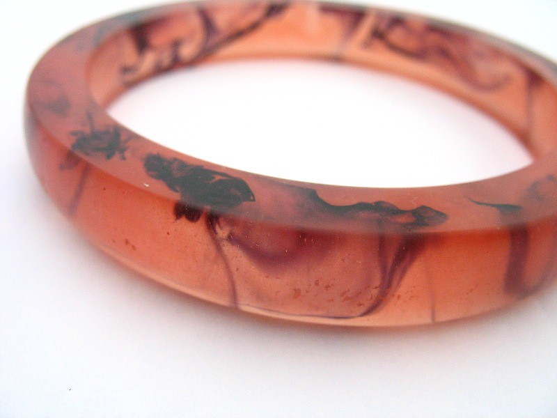 Reticulated python patterned Rani resin bangle in grapefruit pink