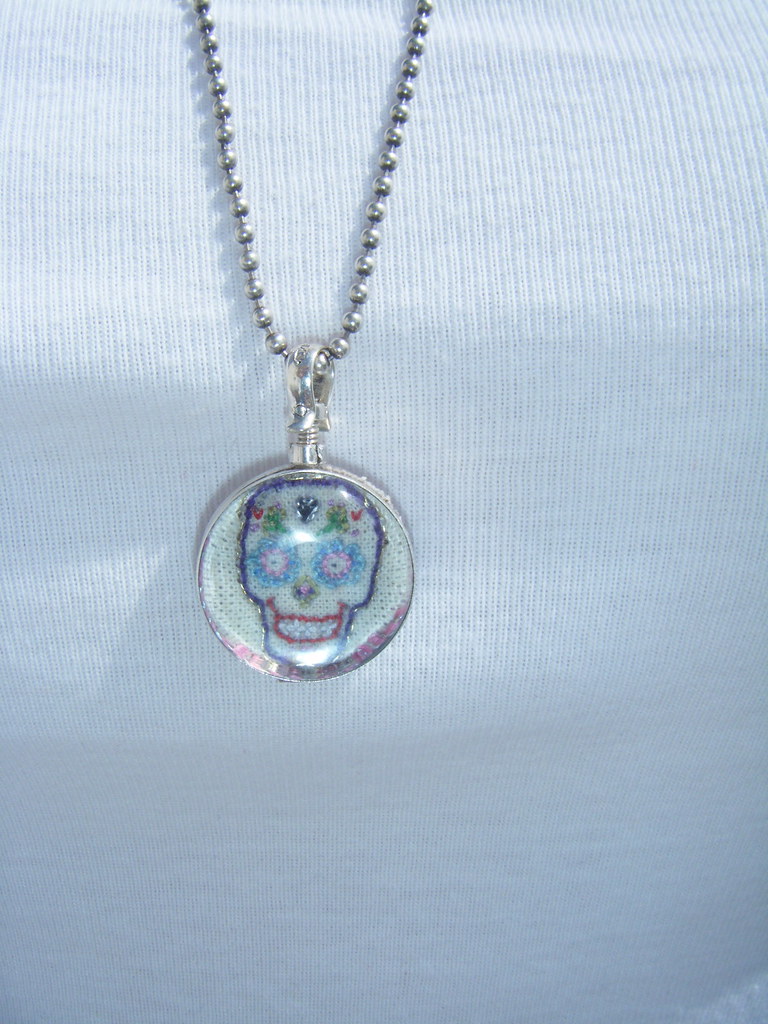 Hand Embroidered Day of Dead Art Piece in a Two Sided Glass Locket , Sterling Silver Mounted Pendant