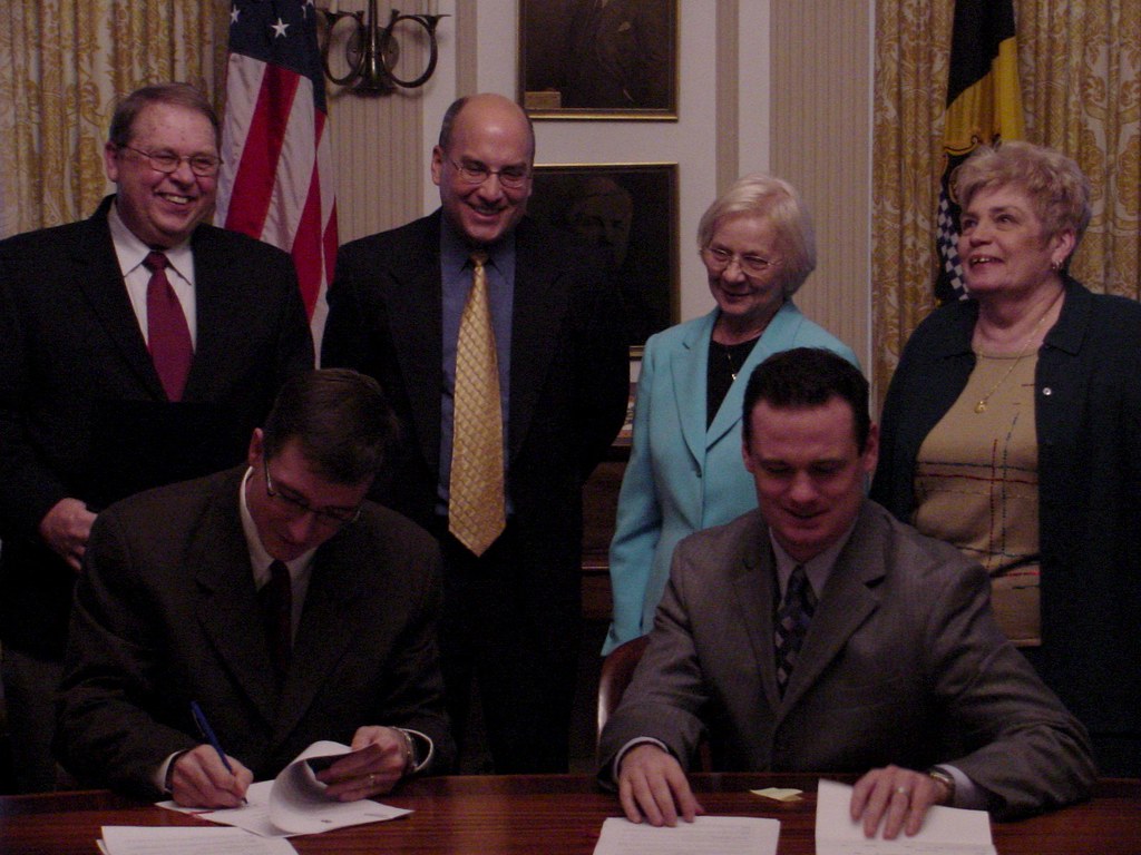 Jim looks on as Mayor Ravenstahl signs lease agreement with SPDC