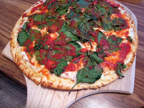 frozen cheese pizza + spinach + tomato sauce