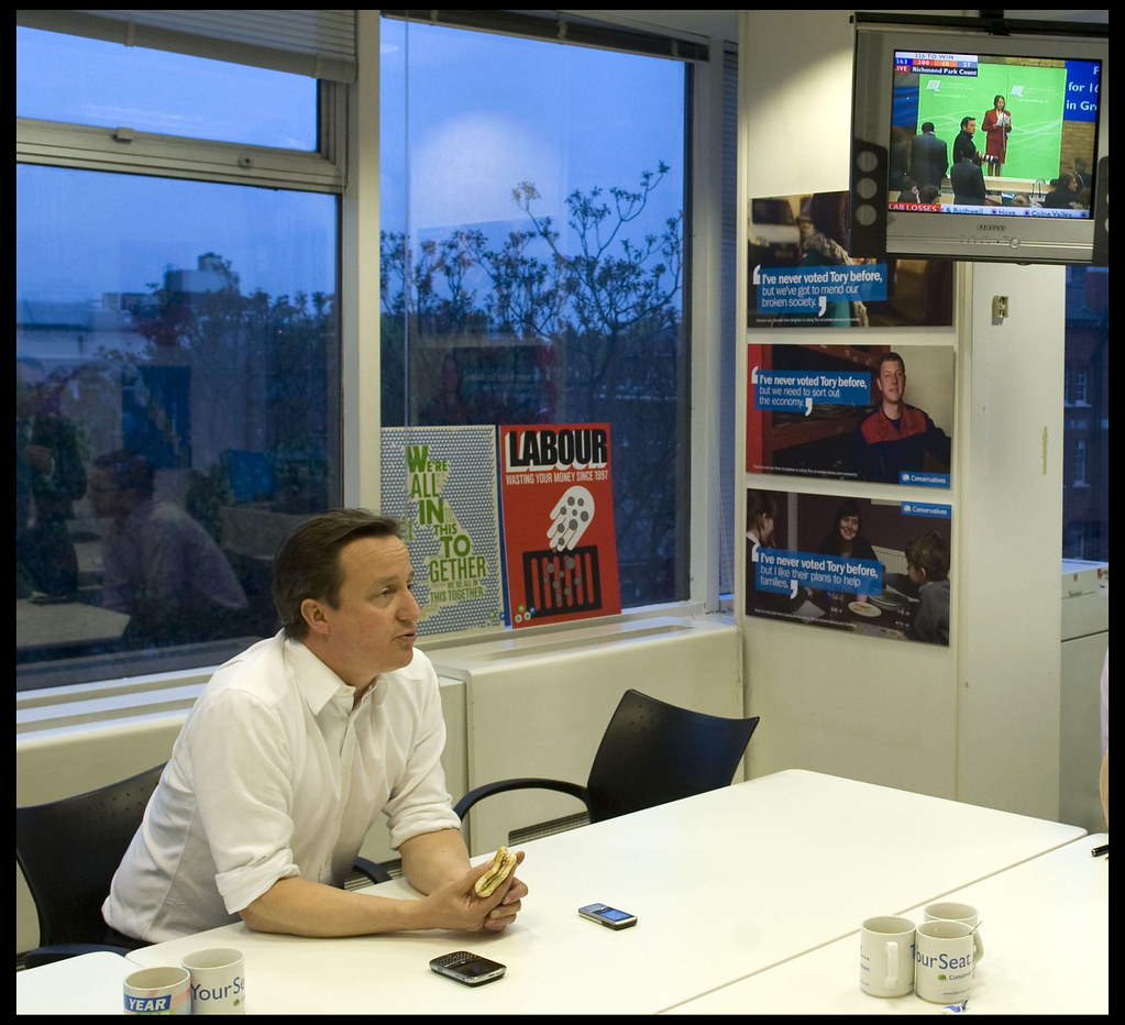 David Cameron eats his breakfast in his office in CCHQ as he watches the election results come in