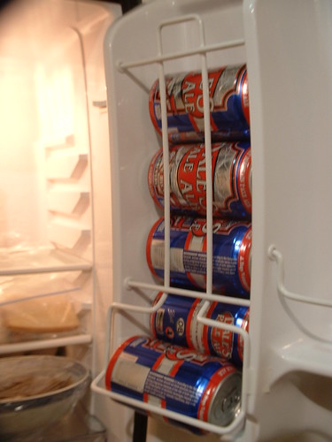can dispenser. in the beer fridge.
