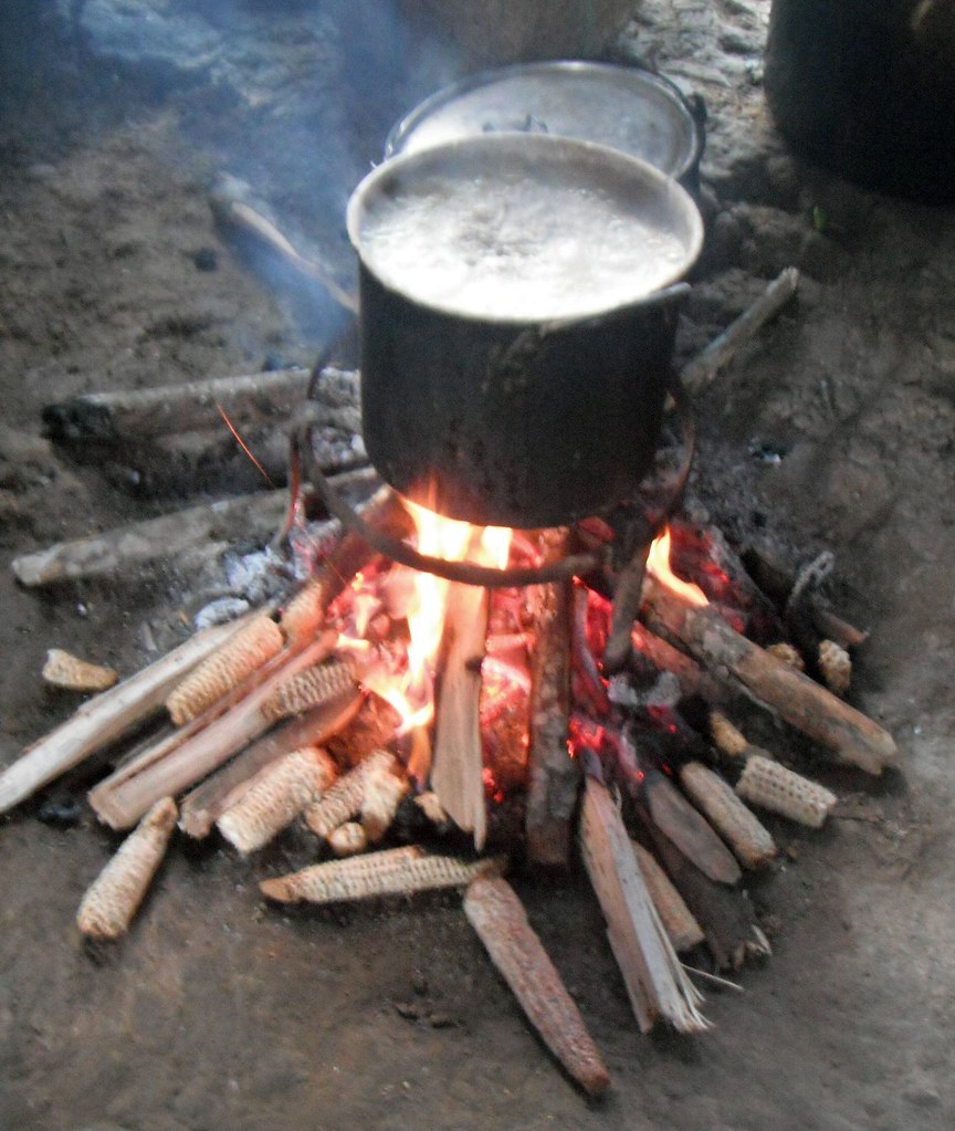 Cooking (without a lid) indoors, on an open fire