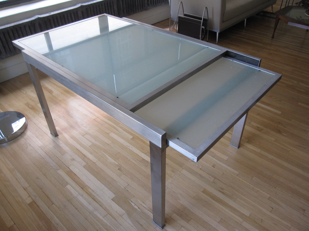 Expandable glass top table Conran Shop