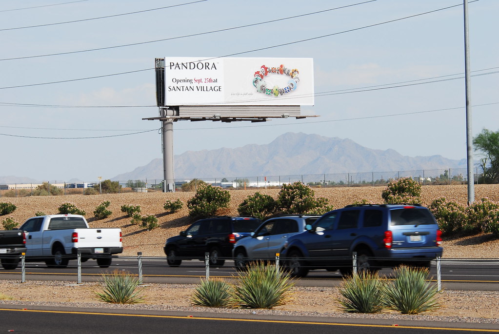 Pandora Grand Opening Sept. 25 at Santan Village - Santan Freeway Loop 202 billboard