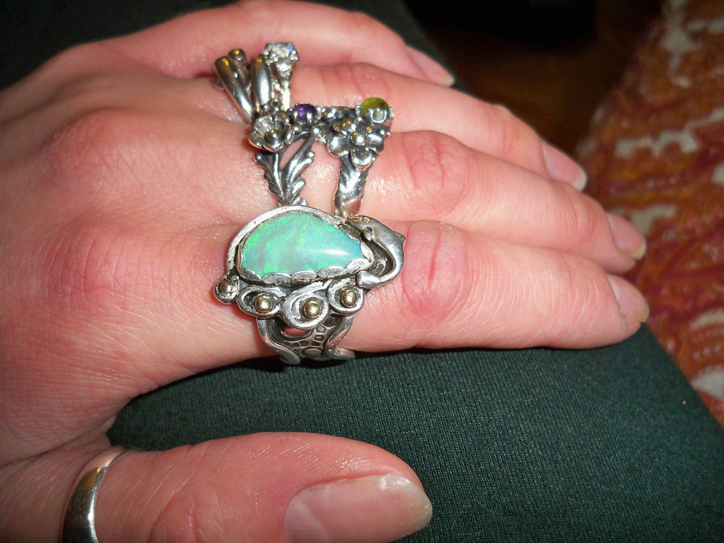 Nereus Favor Ring of wisdom black opal set in sterling silver
