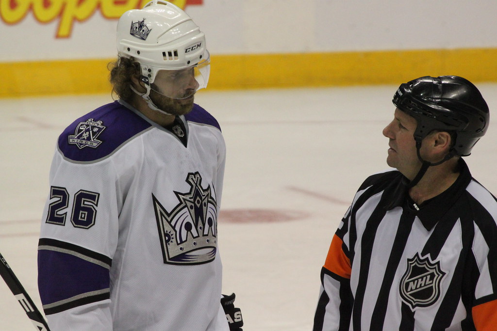 Michal Handzus (Kings) and referee Dan O'Rourke talking during the timeout