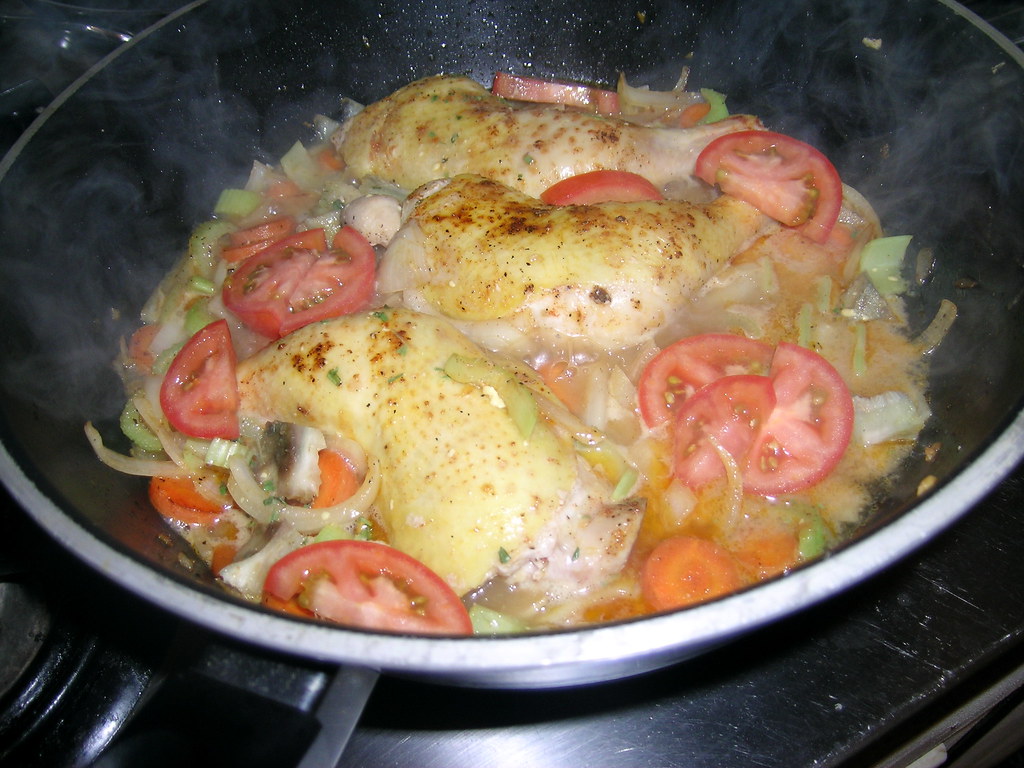 Chicken legs cooking in sherry sauce