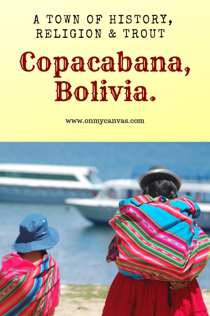 women+daughter+walking+towards+ferries+shore+el+lago+titicaca+copacabana+bolivia