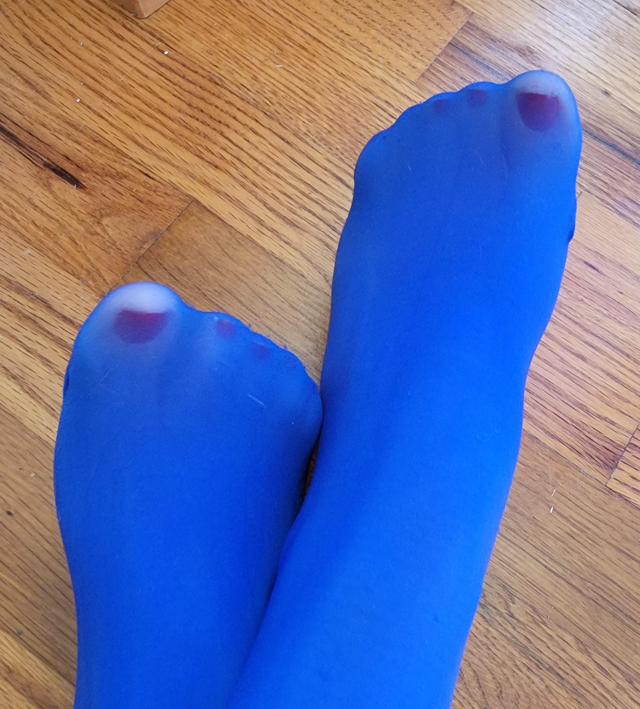 Pretty red toes through blue